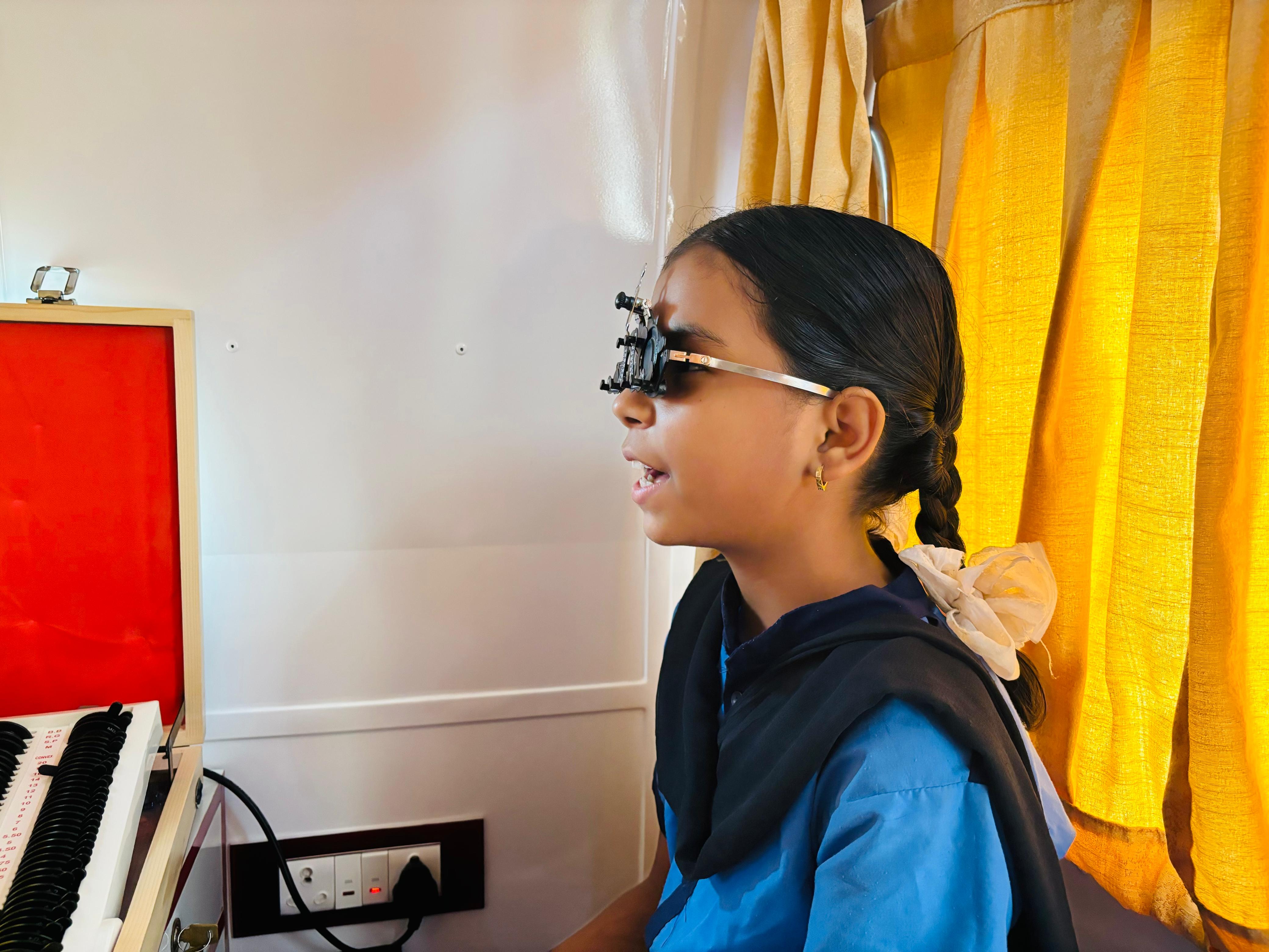A patient receiving care at a Chaitanyam eye camp